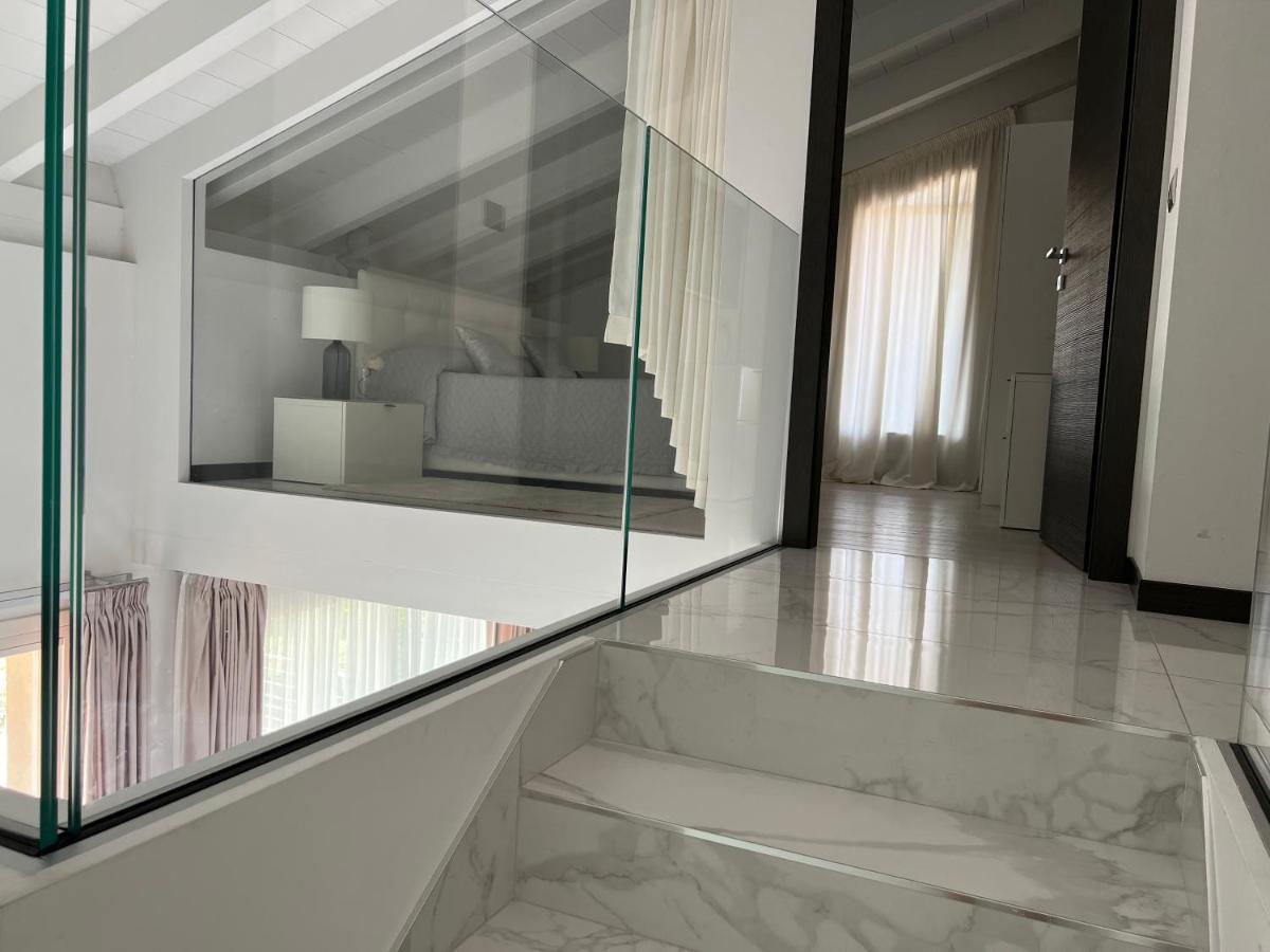 Paganini Suites And Apartments Sirmione Bagian luar foto